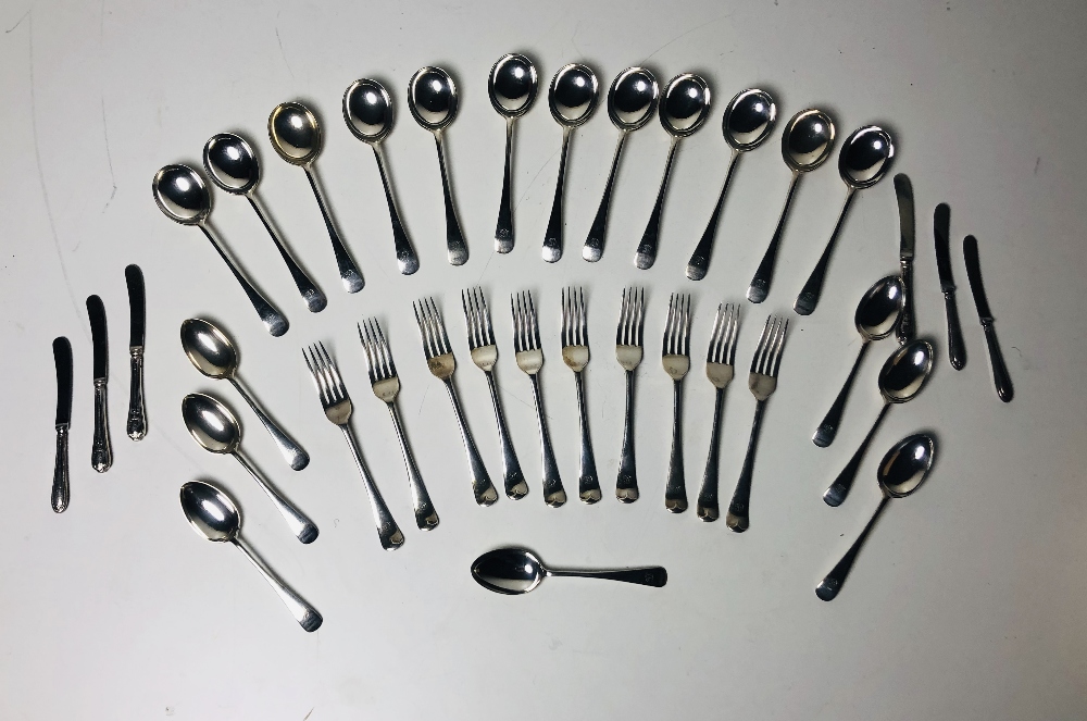 A set of 12 silver Forks, 12 silver Dessert Spoons, 12 starter Knives and Forks by Henry Wilkinson,