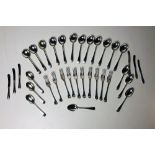 A set of 12 silver Forks, 12 silver Dessert Spoons, 12 starter Knives and Forks by Henry Wilkinson,