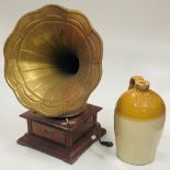 A small reproduction Table Gramahpone with brass horn speaker;