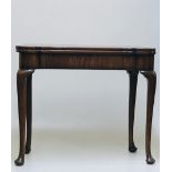 A 19th Century Irish mahogany fold-over Games Table,