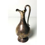 An attractive Victorian English silver Claret Jug, with engraved floral and vine decoration,