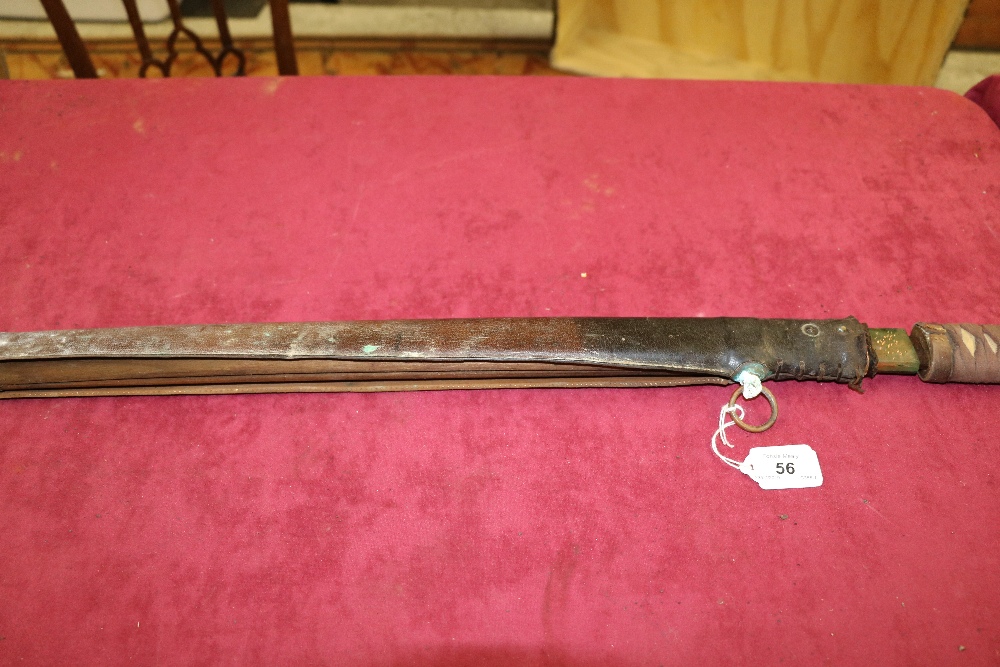 A large 19th Century Japanese Katana Sword, with 29 1/4" blade, in leather covered wooden scabbard, - Image 3 of 8