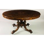 A Victorian oval walnut and inlaid Loo Table,