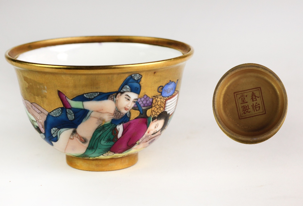 A 19th Century Chinese porcelain "Erotic" Bowl, with gilt background depicting figures,