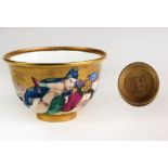 A 19th Century Chinese porcelain "Erotic" Bowl, with gilt background depicting figures,
