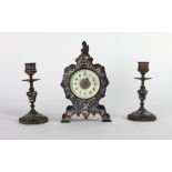 An attractive small 19th Century cloisonné enamel Clock Set, with shaped clock,