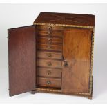 A fine quality mid-18th Century yew-wood miniature Apprentice Cabinet,