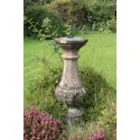 A 19th Century carved bulbous shaped octagonal pillar Sundial, with slate and steel dial on top,