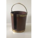 A 19th Century Irish mahogany brass bound latted Plate Bucket,