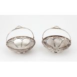 A small pair of Edwardian English silver circular Baskets,