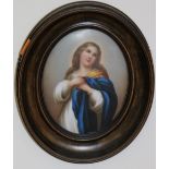 A small oval 19th Century painted porcelain Plaque of The Madonna, approx. 12cms x 9cms.