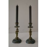 A pair of fine quality 19th Century brass and champlevé figural Candlesticks of cherubs,