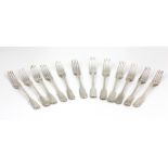 A fine heavy matched set of 12, English silver Dinner Forks,