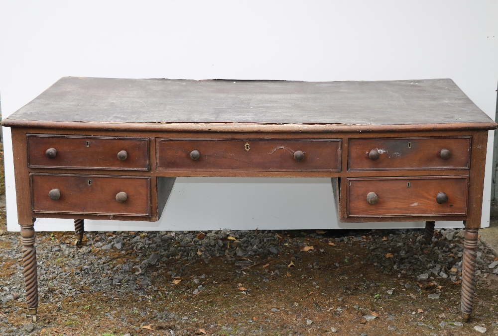 A large Irish Nelson period mahogany Partners Desk, on turned legs, 183cms (72") long.