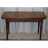 A 19th Century mahogany Side Table, with double moulded top, on four turned legs,