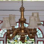 A carved four branch giltwood Chandelier.