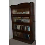 A Globe Wernick "The Lebus" Stacking oak Bookcase, with sliding glazed doors.