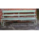 Two similar wooden and iron Garden Seats.