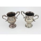 A pair of attractive 18th Century Irish silver two handled Cups, c.