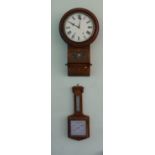 An Edwardian inlaid circular Wall Clock, with Roman numerals; together with a square dial barometer.