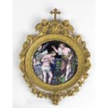 An attractive and rare small painted enamel circular Plaque,