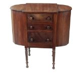 An unusual 19th Century mahogany Work Table, with side wool bins and three centre drawers,