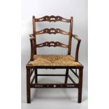 An Irish early 19th Century style ladder back Armchair,