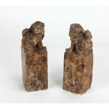 A pair of early Chinese soapstone carved Figures of Dogs of Foo, each with script on front,