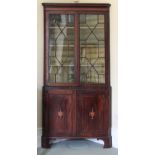 A George III period mahogany and satinwood inlaid Corner Cabinet,
