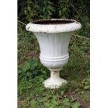 A pair of Victorian cast iron tall finial Urns, on circular bases, each approx. 71cms (28")h.
