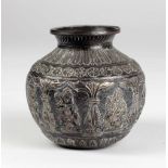 An early Indian bronze and silver overlaid Urn, profusely chased in relief with figures in panels,