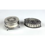 An attractive circular lift top silver Ring Box, with engraved monogram,