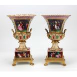 A pair of 19th Century gilt and porcelain Vases, with mask and scroll handles,