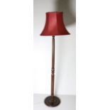 A wooden Lamp Standard, with maroon shade, a small wooden Table Lamp with cream shade,