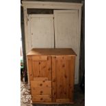 A large painted pine Wardrobe or Press, with two panel doors, an old pine painted five drawer Chest,
