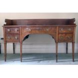 A George III period Sideboard, in figured mahogany with serpentine front and shaped back,