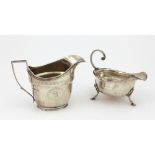 A good English Georgian silver Cream Jug, with bright cut decoration and motto "Paratus Sum,