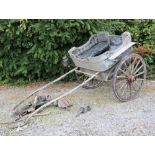 A late 19th Century Pony Trap, with cushions, leather tack etc., by Donaghy Makers, Thurles.