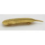 A fine quality 18ct gold Brooch, in the shape of a feather, by Hermés of Paris. (1) N.B. 6.