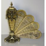 An attractive heavy brass Peacock Fan Firescreen.