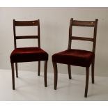 A matching set of four small Regency period mahogany Side Chairs, with reeded sabre legs,