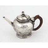 An early and rare 18th Century English silver bullet shaped Teapot,