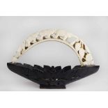 An attractive carved ivory and hardwood Basket, with animal bridge handle depicting elephant,