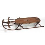 A late 18th Century / early 19th Century wrought iron and oak framed 'Flexible Flyer' Children's