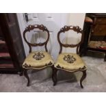 A set of 6 attractive carved Victorian walnut open back Dining Chairs,