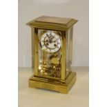 An attractive late Victorian brass cased Mantle Clock (88 Days?) with four bevelled glass panels,