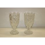 A pair of attractive "Waterford" cutglass Vases, with shell decorated and shaped rims,