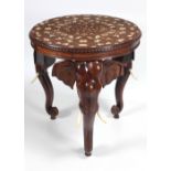 An unusual circular Oriental ivory inlaid Occasional Table, decorated with flowers,