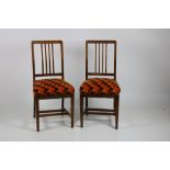 A matching set of 15 solid oak rail-back Dining Chairs,