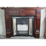 An attractive mahogany Fire Surround, with cast iron and tiled inset.